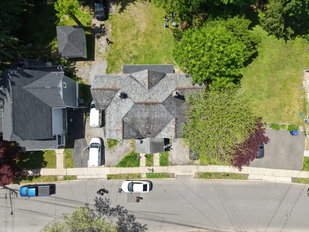 Top-down drone photo of a residential home, roof, and driveway in New Jersey